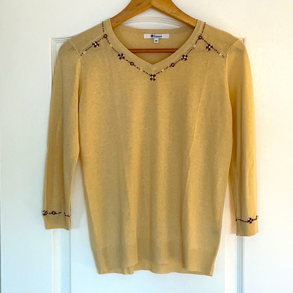 Suzuya sweater with bead detailing.